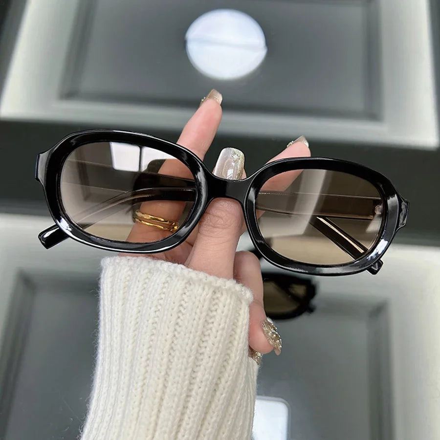 Eclipse Oval Fashion Sunnies Timeless style with a bold reflection.