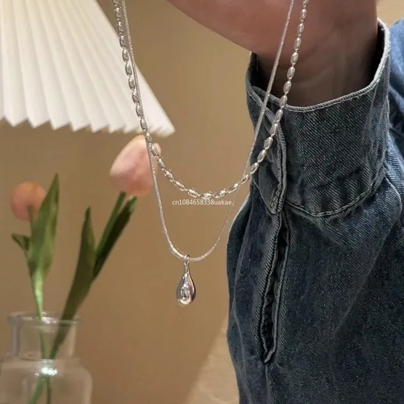 Silver Cascade Drop Necklace Minimal design, maximum sophistication.