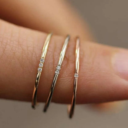 Aramnew Celeste Gold Harmony Ring Three layers of elegance, one refined statement.