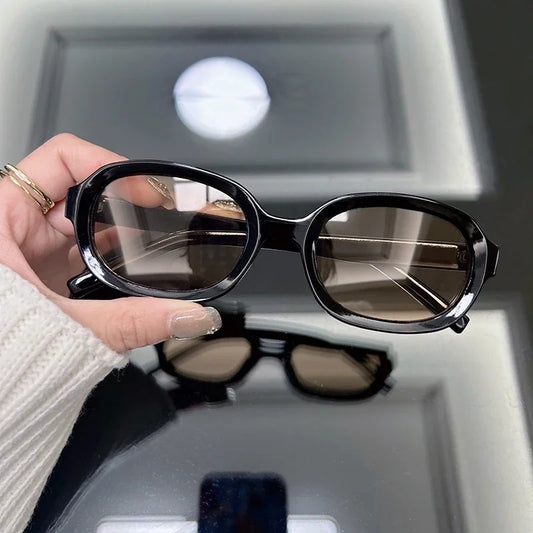 Eclipse Oval Fashion Sunnies Timeless style with a bold reflection.