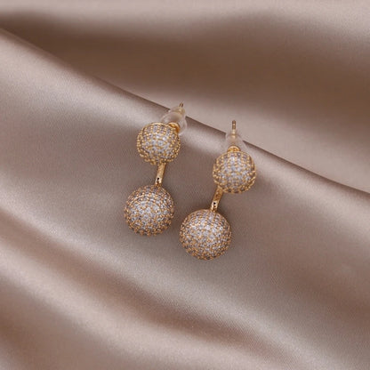 Aramnew Aurora Curve Zircon Earrings Where light meets luxury in every movement.