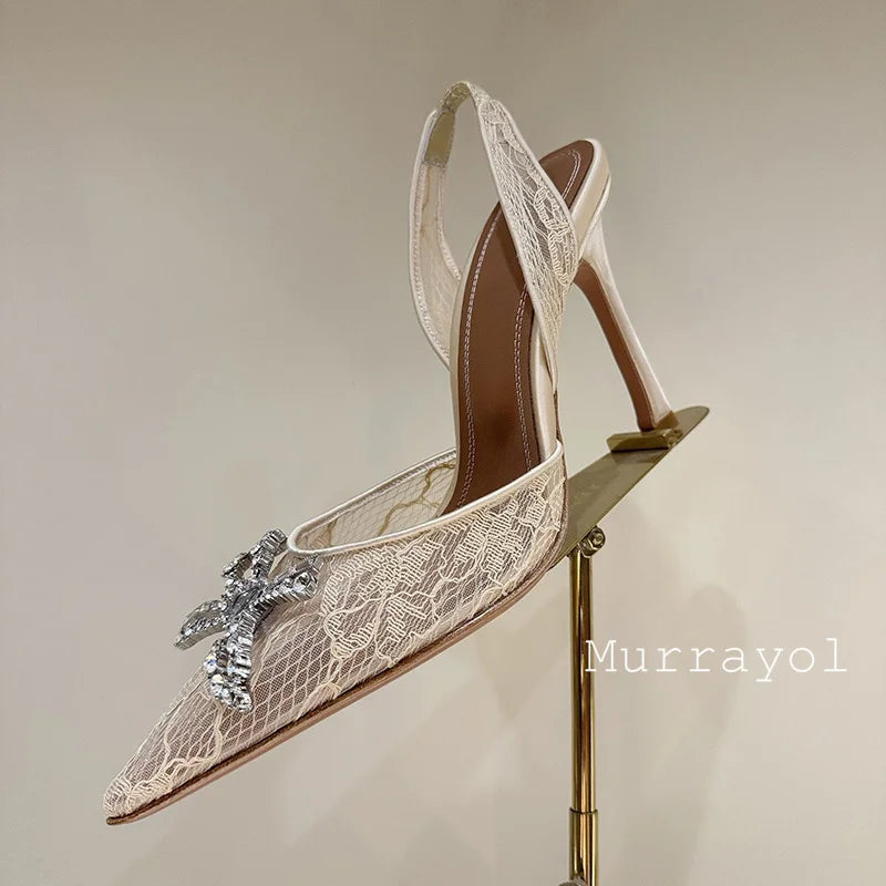 Aramnew Royal Spark Stilettos Sophisticated high heels with dazzling rhinestone detail for a timeless and feminine style.