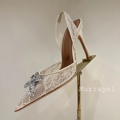 Aramnew Royal Spark Stilettos Sophisticated high heels with dazzling rhinestone detail for a timeless and feminine style.