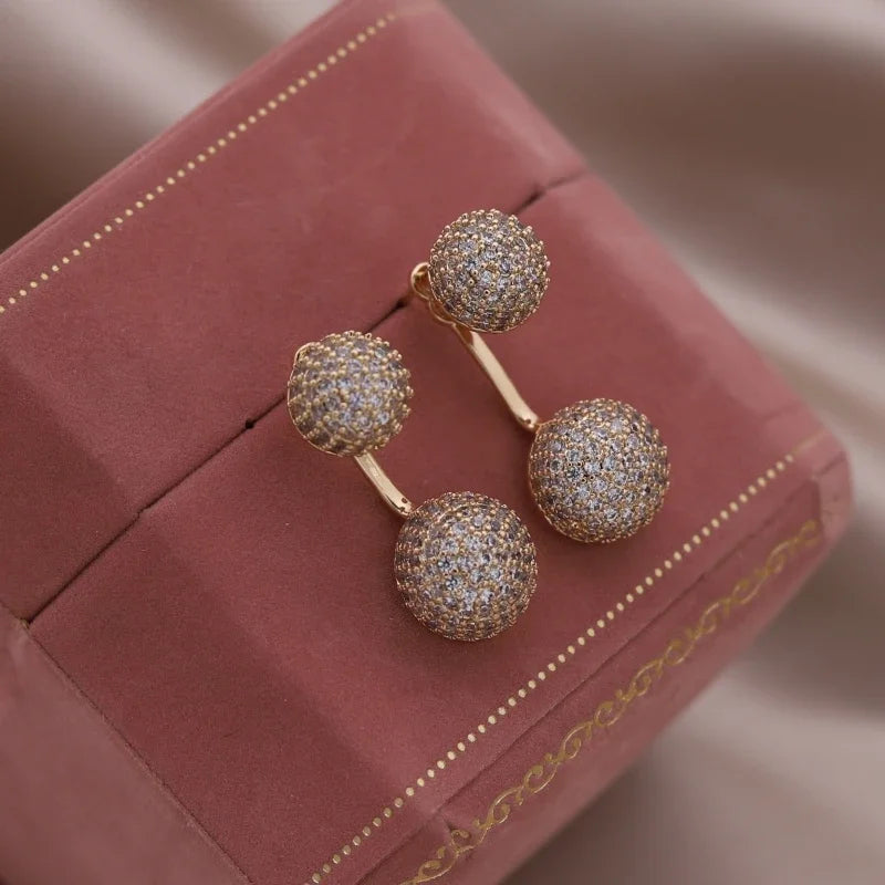 Aramnew Aurora Curve Zircon Earrings Where light meets luxury in every movement.