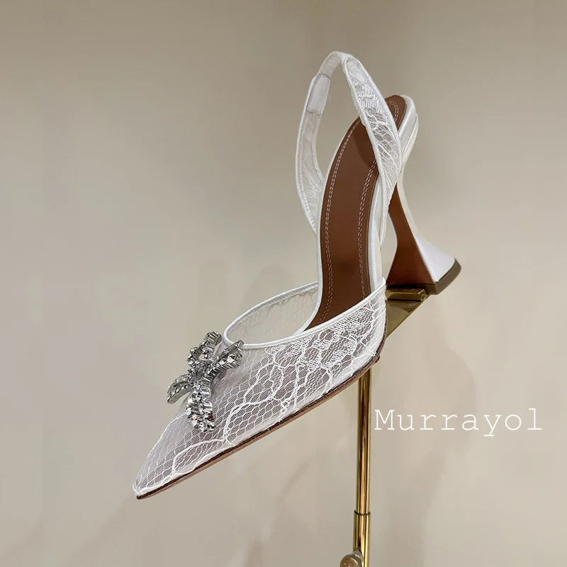 Aramnew Royal Spark Stilettos Sophisticated high heels with dazzling rhinestone detail for a timeless and feminine style.