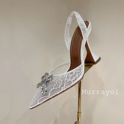 Aramnew Royal Spark Stilettos Sophisticated high heels with dazzling rhinestone detail for a timeless and feminine style.