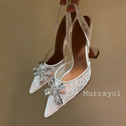 Aramnew Royal Spark Stilettos Sophisticated high heels with dazzling rhinestone detail for a timeless and feminine style.