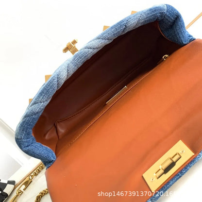 ARAMNEW BLUE REIGN Handbag. Rule the look. Own the moment.