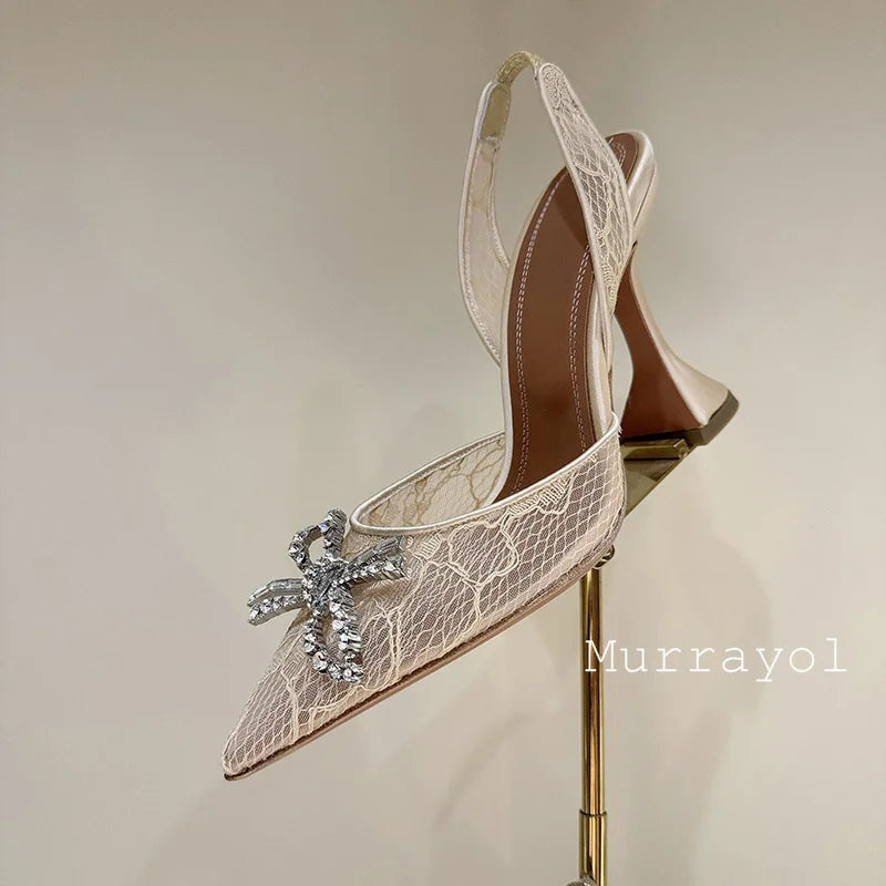 Aramnew Royal Spark Stilettos Sophisticated high heels with dazzling rhinestone detail for a timeless and feminine style.