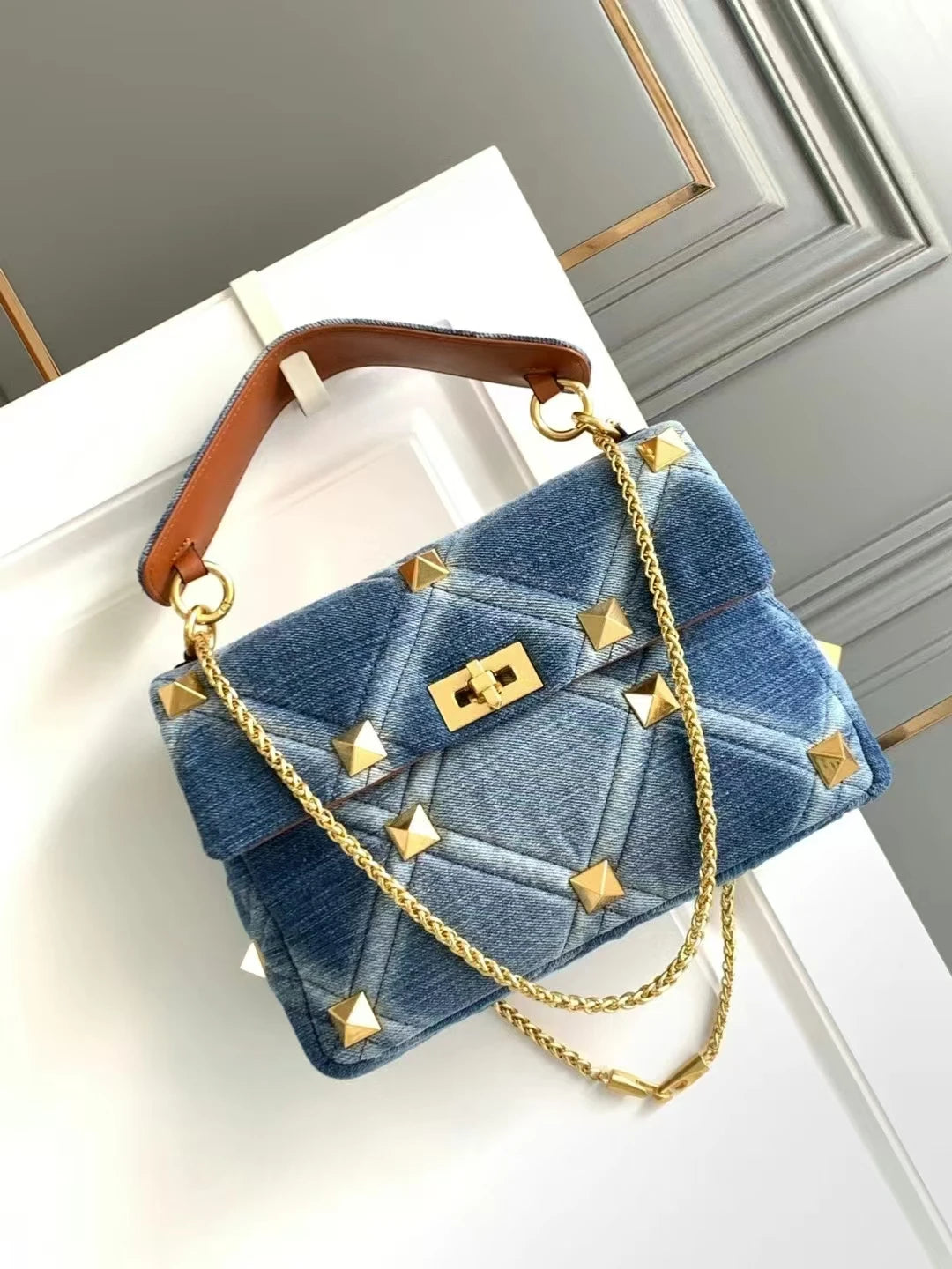 ARAMNEW BLUE REIGN Handbag. Rule the look. Own the moment.