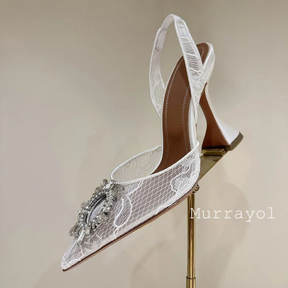 Aramnew Royal Spark Stilettos Sophisticated high heels with dazzling rhinestone detail for a timeless and feminine style.