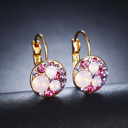 Golden Halo Crystal Drops Radiant elegance framed in 18K gold.