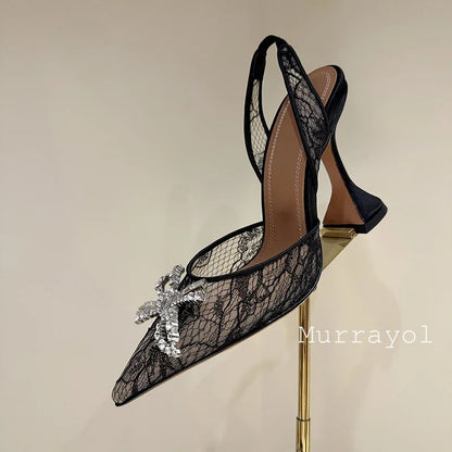 Aramnew Royal Spark Stilettos Sophisticated high heels with dazzling rhinestone detail for a timeless and feminine style.