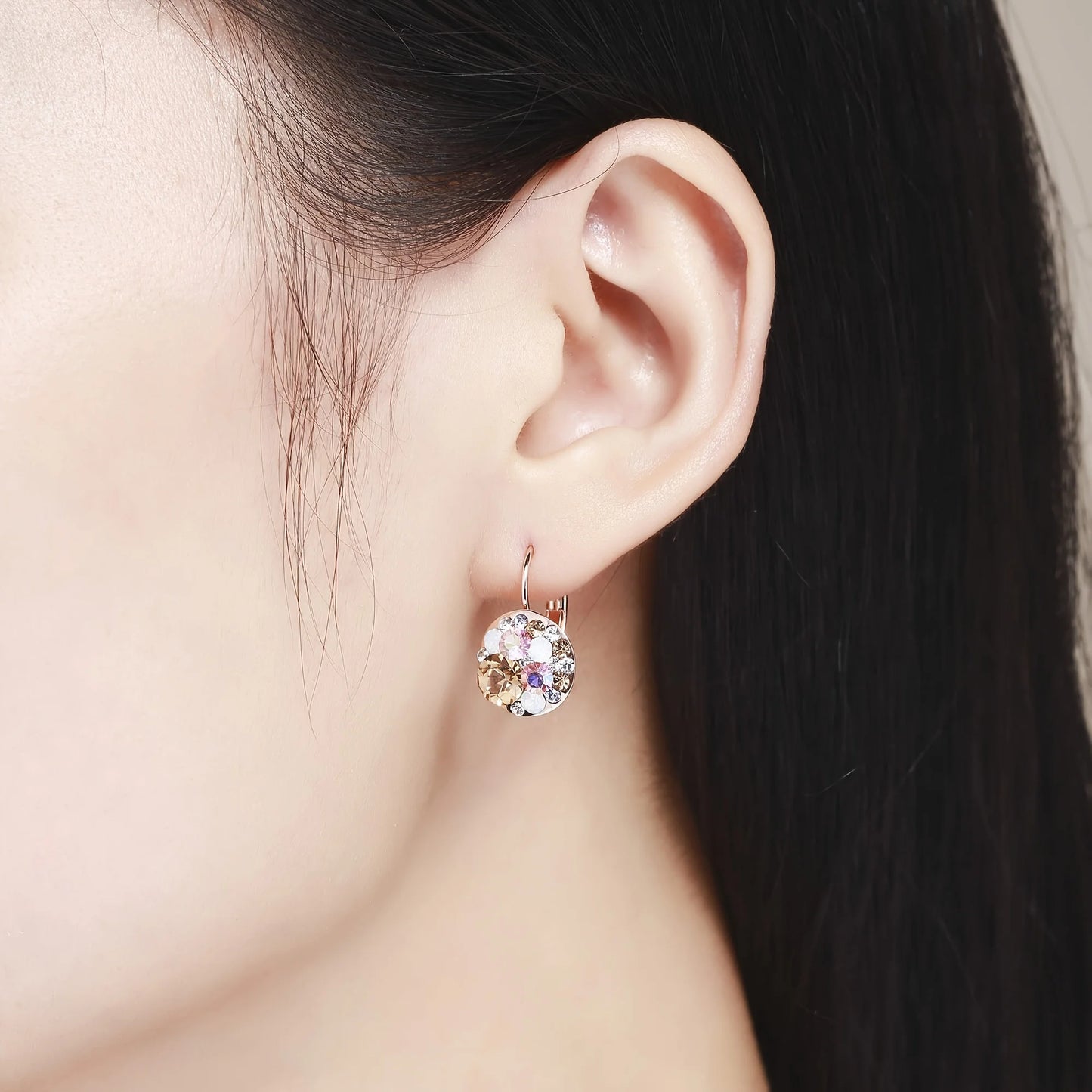 Golden Halo Crystal Drops Radiant elegance framed in 18K gold.