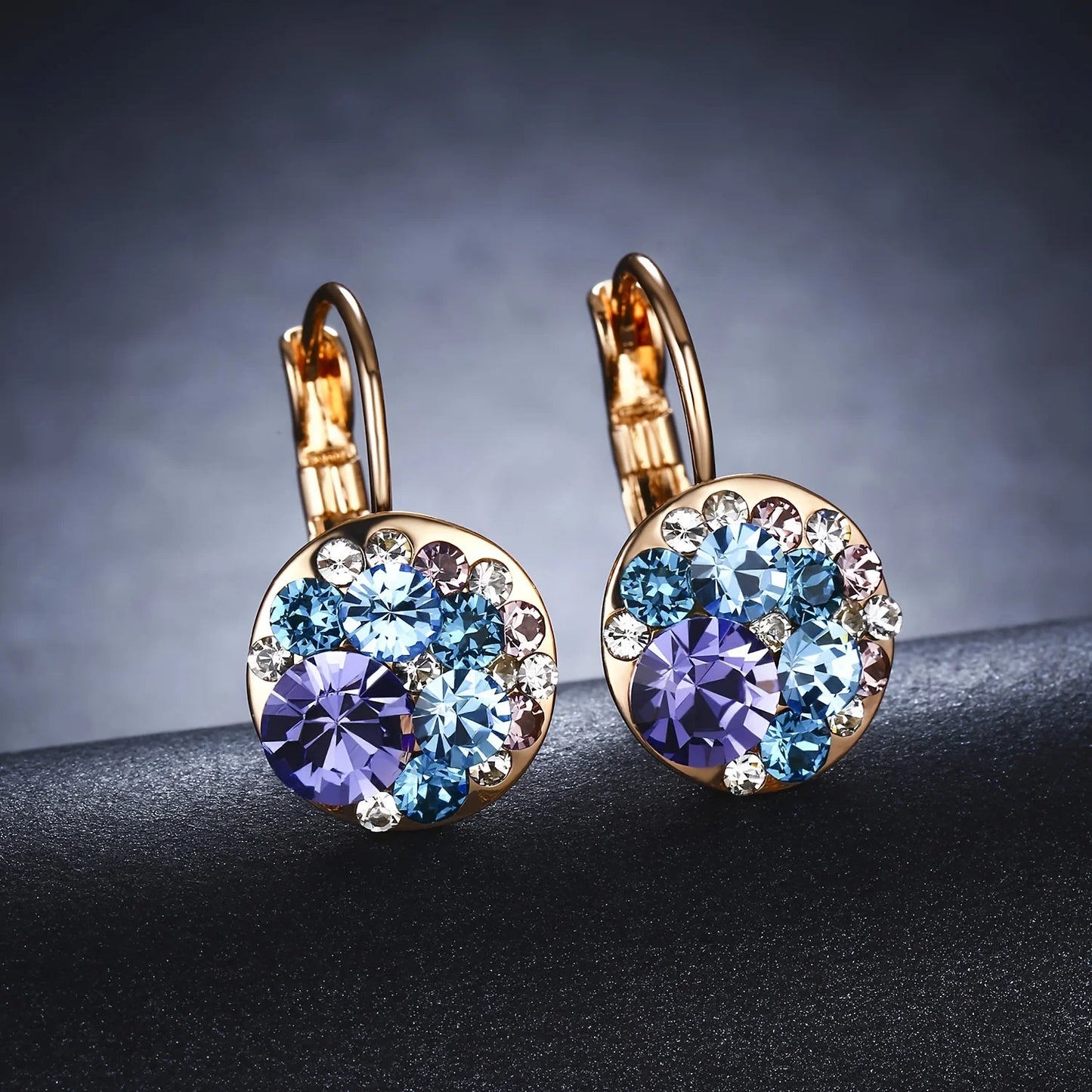 Golden Halo Crystal Drops Radiant elegance framed in 18K gold.