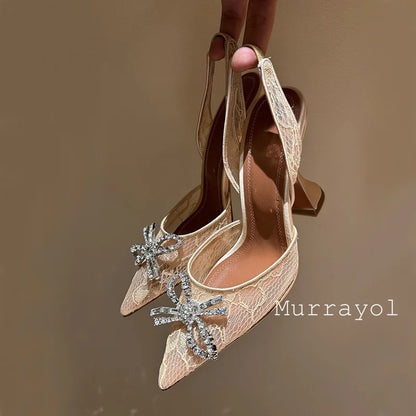 Aramnew Royal Spark Stilettos Sophisticated high heels with dazzling rhinestone detail for a timeless and feminine style.