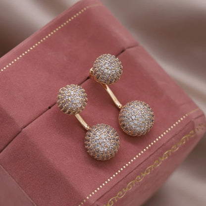 Aramnew Aurora Curve Zircon Earrings Where light meets luxury in every movement.