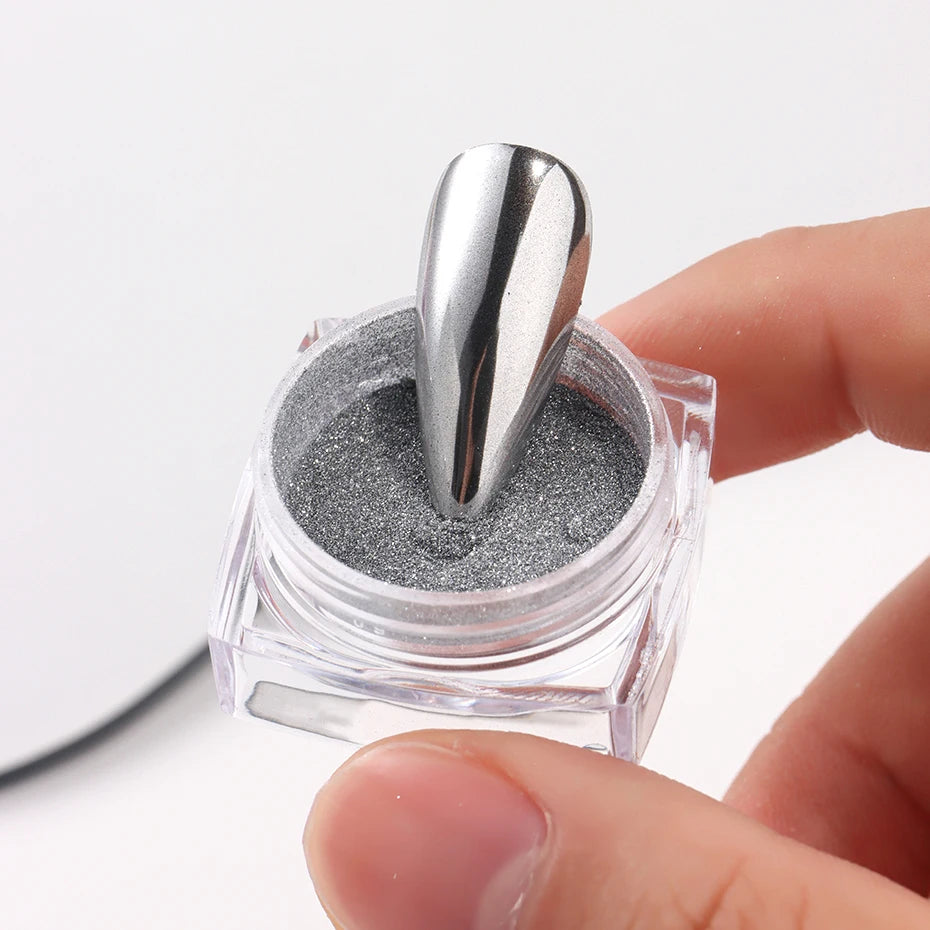 Platinum Prism Chrome Dust Collection Create bold, mirror-perfect nails at home.