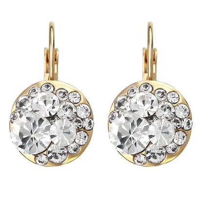 Golden Halo Crystal Drops Radiant elegance framed in 18K gold.
