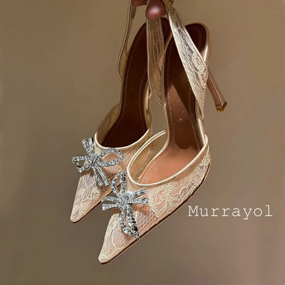 Aramnew Royal Spark Stilettos Sophisticated high heels with dazzling rhinestone detail for a timeless and feminine style.