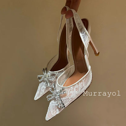 Aramnew Royal Spark Stilettos Sophisticated high heels with dazzling rhinestone detail for a timeless and feminine style.
