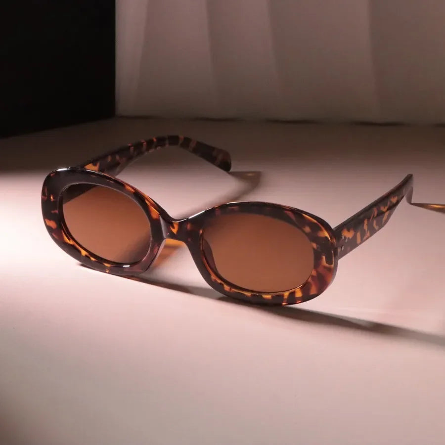 Luna Reflect Round Sunglasses Timeless style with a fearless shine.