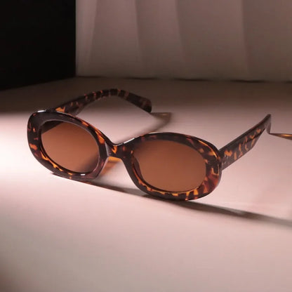 Luna Reflect Round Sunglasses Timeless style with a fearless shine.