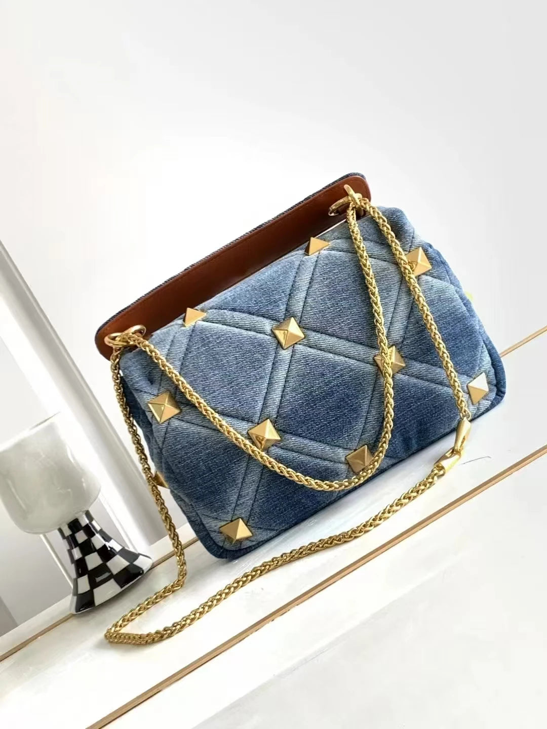 ARAMNEW BLUE REIGN Handbag. Rule the look. Own the moment.
