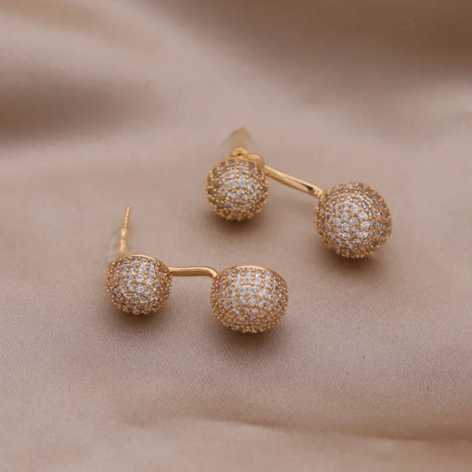 Aramnew Aurora Curve Zircon Earrings Where light meets luxury in every movement.