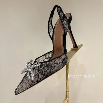 Aramnew Royal Spark Stilettos Sophisticated high heels with dazzling rhinestone detail for a timeless and feminine style.