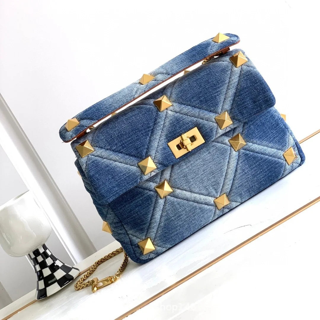 ARAMNEW BLUE REIGN Handbag. Rule the look. Own the moment.