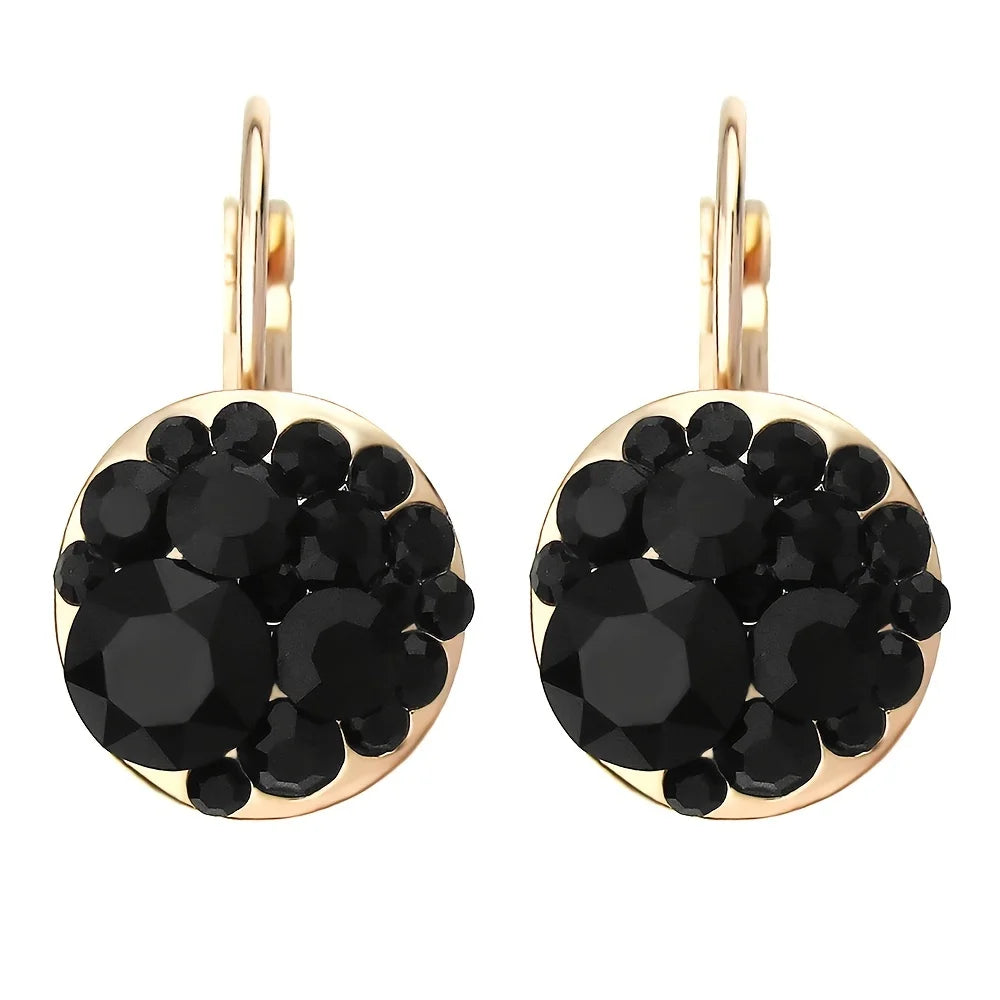 Golden Halo Crystal Drops Radiant elegance framed in 18K gold.