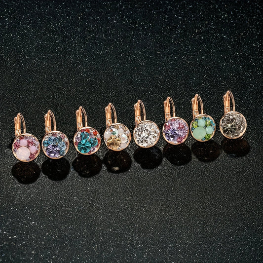 Golden Halo Crystal Drops Radiant elegance framed in 18K gold.