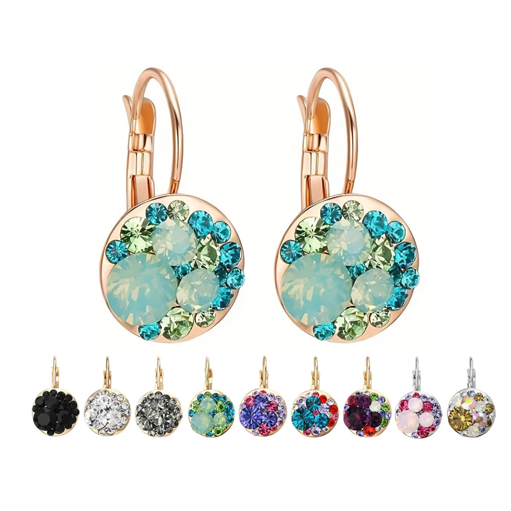 Golden Halo Crystal Drops Radiant elegance framed in 18K gold.