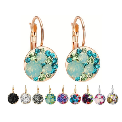 Golden Halo Crystal Drops Radiant elegance framed in 18K gold.