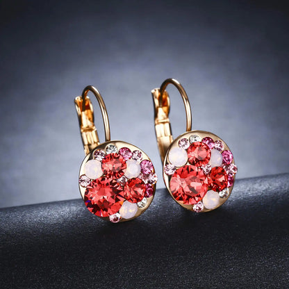 Golden Halo Crystal Drops Radiant elegance framed in 18K gold.