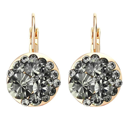 Golden Halo Crystal Drops Radiant elegance framed in 18K gold.