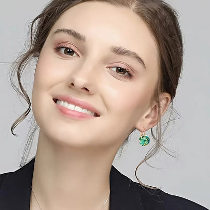 Golden Halo Crystal Drops Radiant elegance framed in 18K gold.